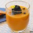 Crema de calabaza con huevas de arenque ahumado y ajo negro